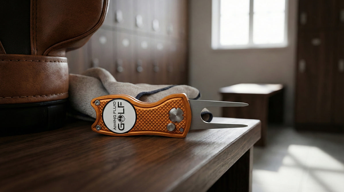 Aiming Fluid Golf metal divot tool designed for course repair and precision grip