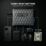 Gray golf bag with 'Aiming Fluid Golf' branding, surrounded by phone, cards, and golf accessories on a black background.
