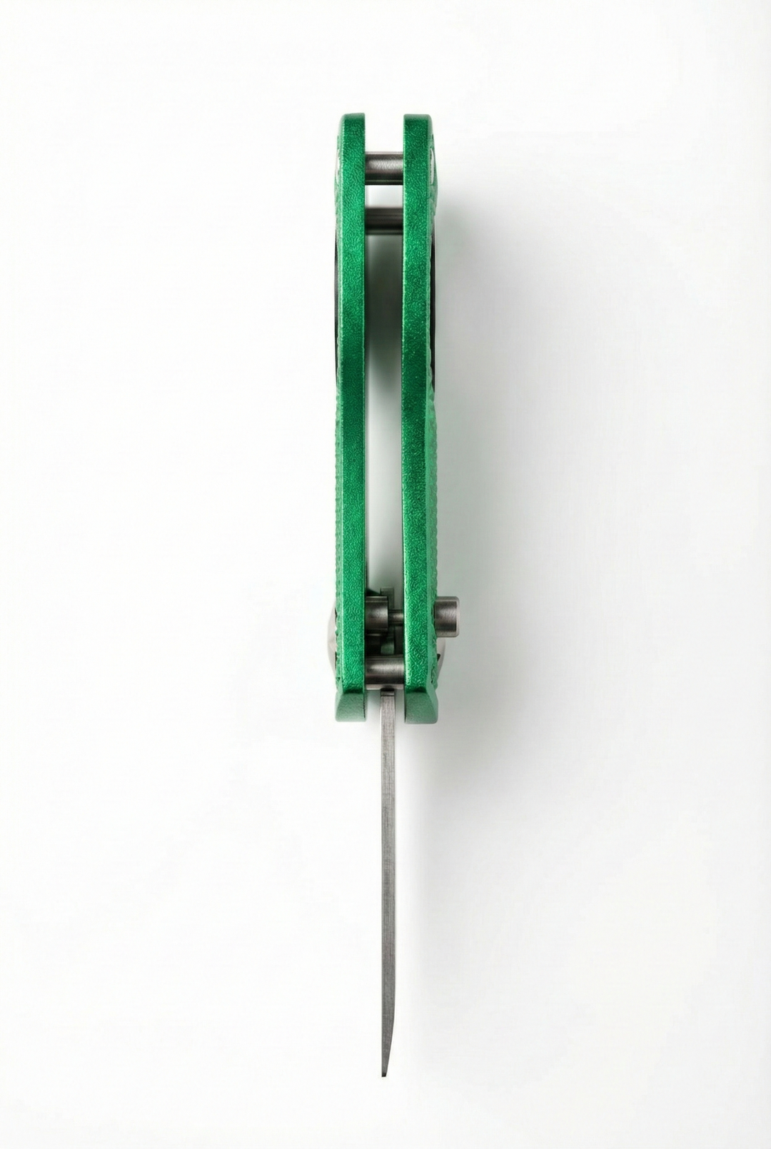 Limited edition divot tool in green with a metal spike, viewed from the top.