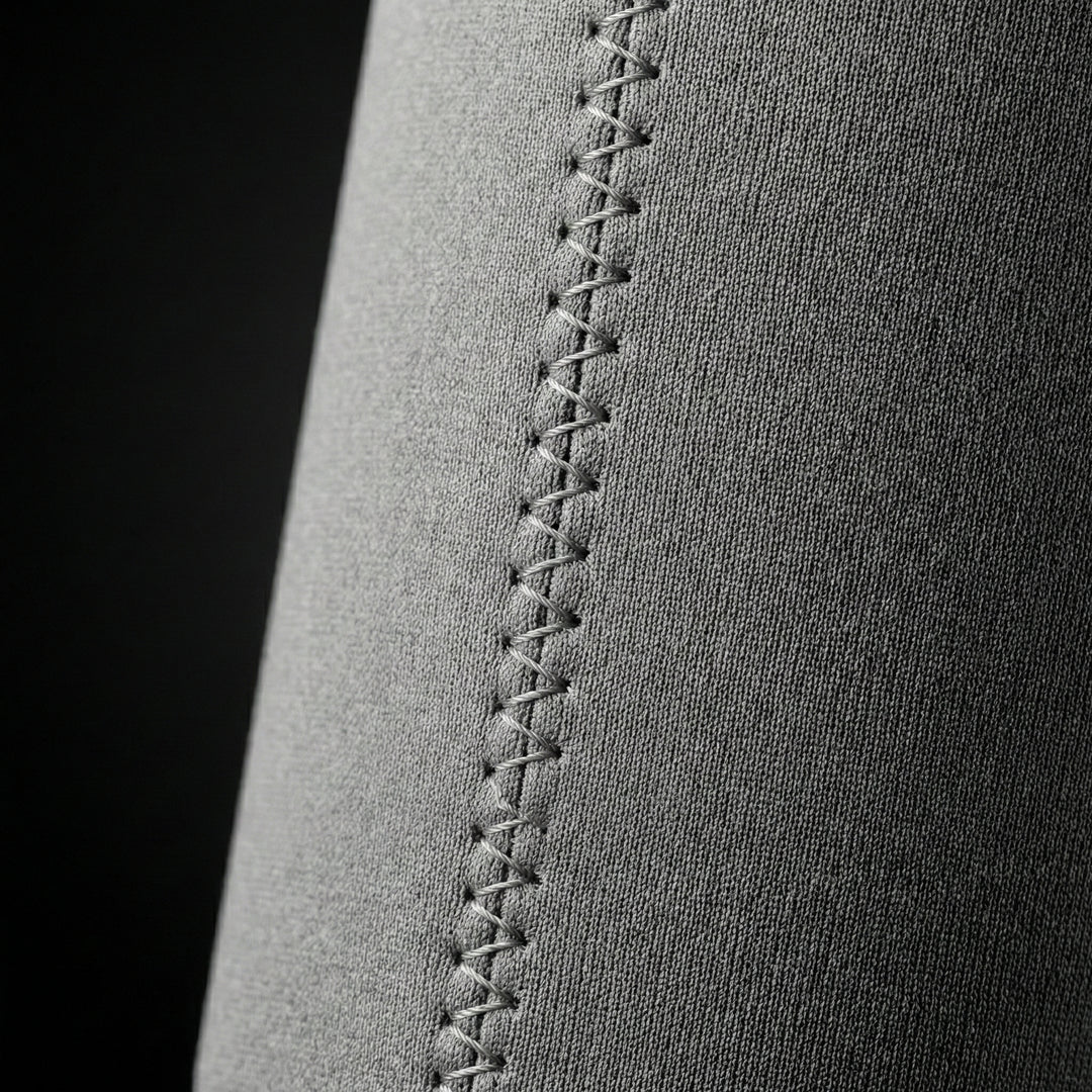 Gray Brewski Koozie with visible stitching detail, designed for holding beverages securely.