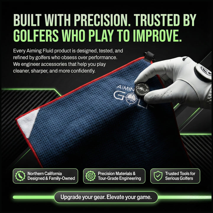 Aiming Fluid Golf The 40 magnetic golf towel held by gloved hand with large microfiber cleaning surface.