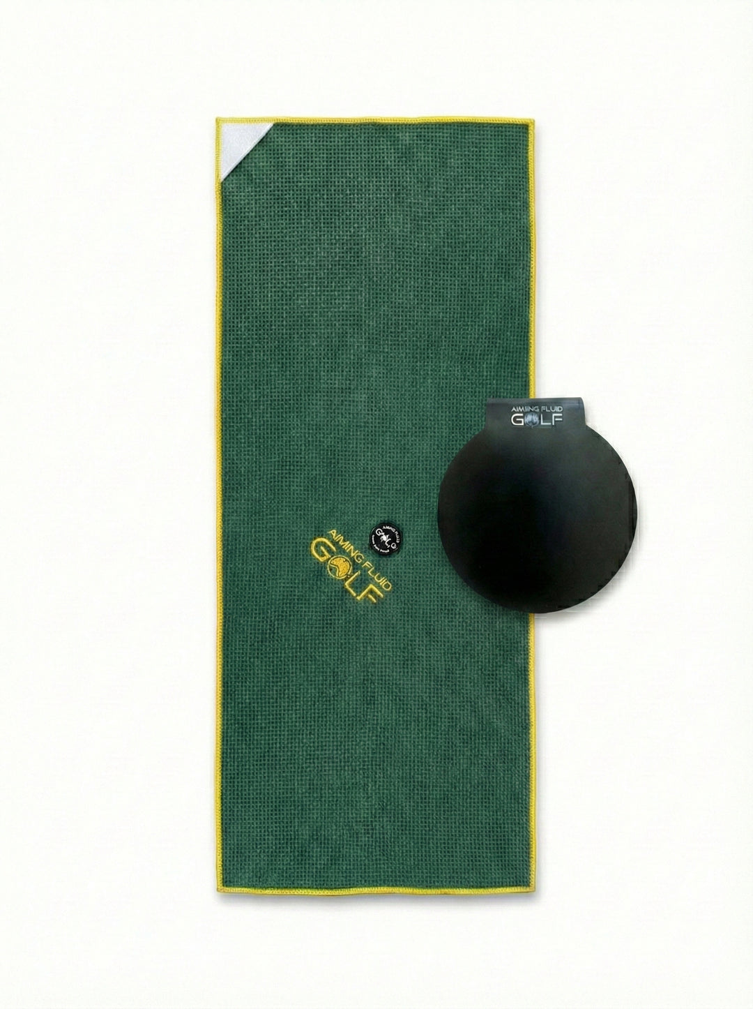 Green The 40 16x40 magnetic golf towel with steel-core Landing Pad on white background.