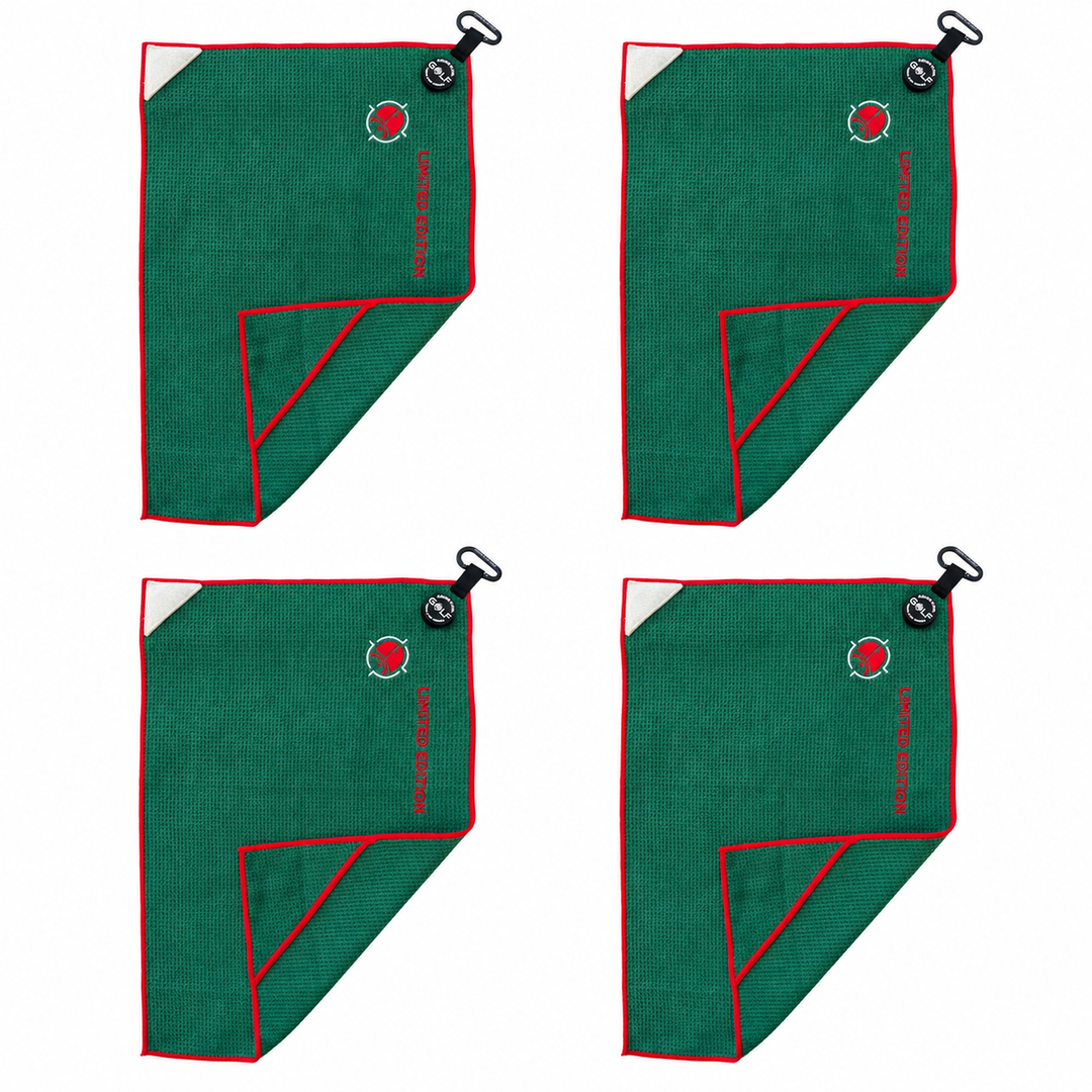 Four Reserve Evergreen magnetic golf towels with red trim on a clean white background