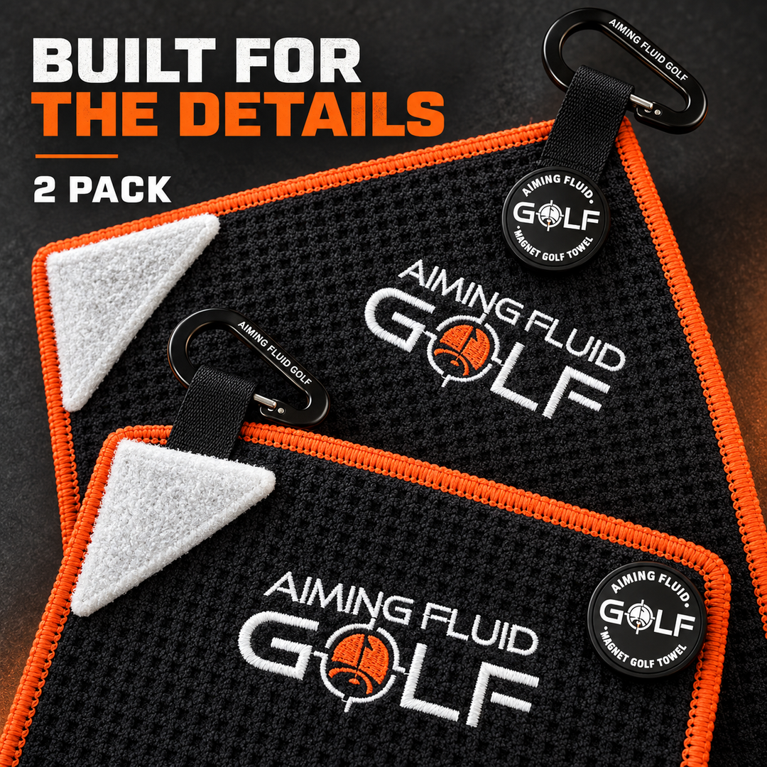 Close-up of two Hazard Orange towels showing waffle texture, scrub corners, magnets, and carabiners