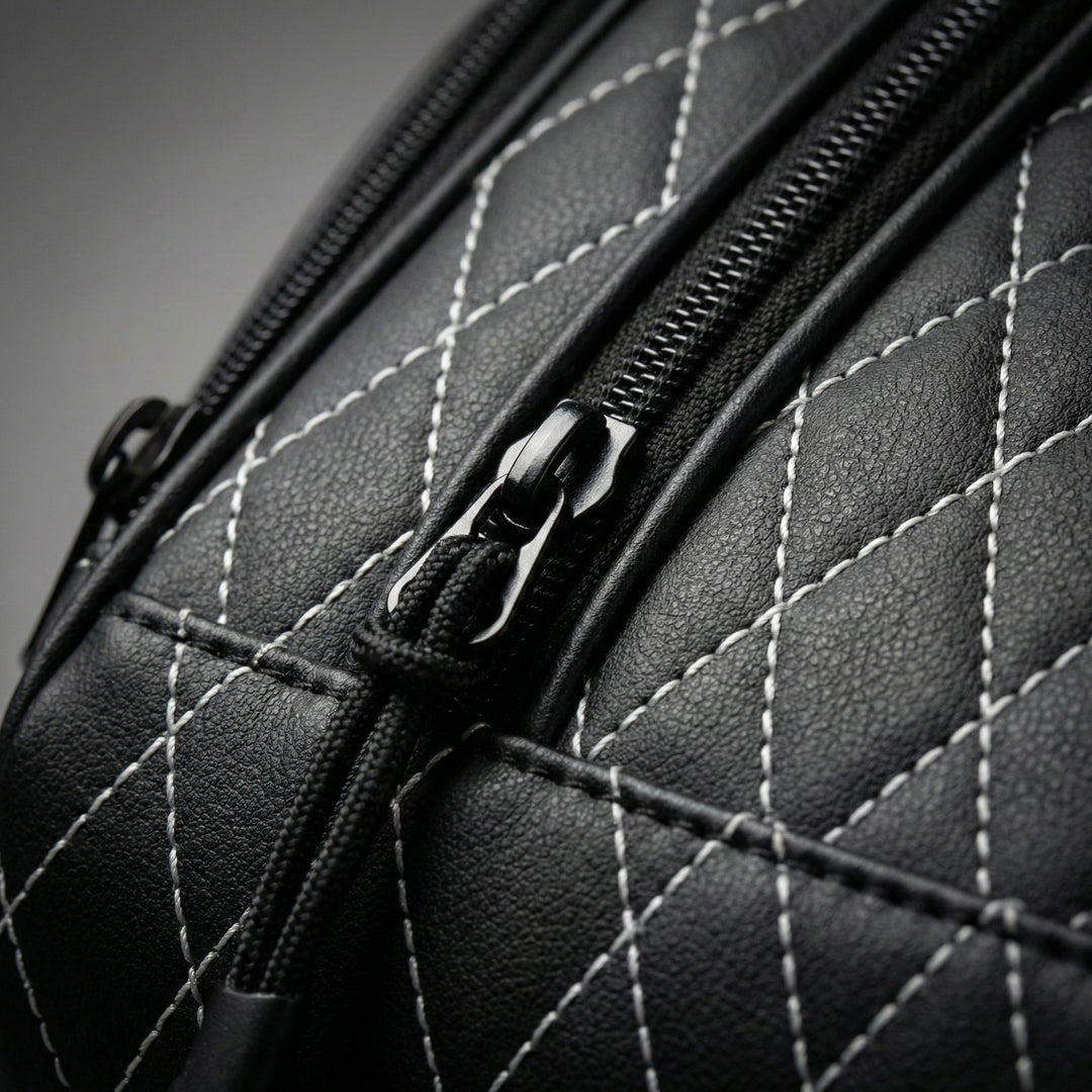 Close-up of the golf shoe bag showing fabric texture, stitching, and zipper detail.