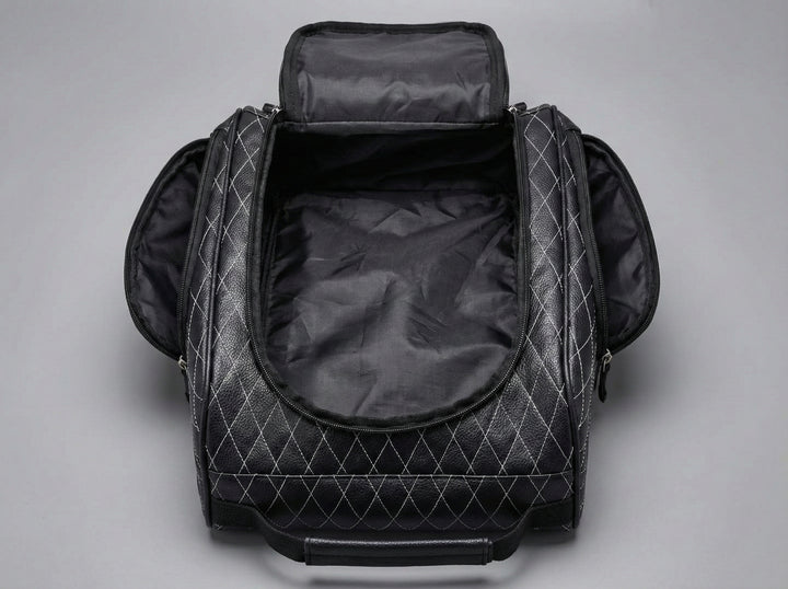 Golf shoe bag shown open with interior compartments visible, including separated shoe storage and zippered sections.