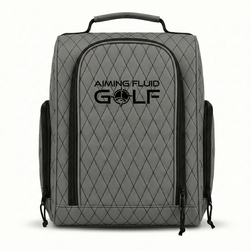 grey Premium golf shoe bag with structured design and zippered closure holding a pair of golf shoes.