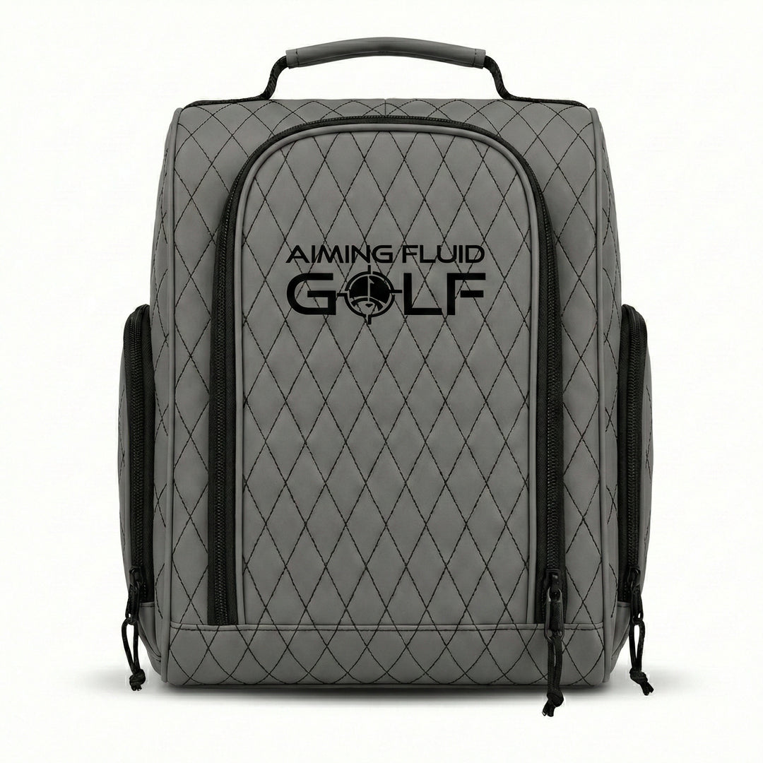 grey Premium golf shoe bag with structured design and zippered closure holding a pair of golf shoes.