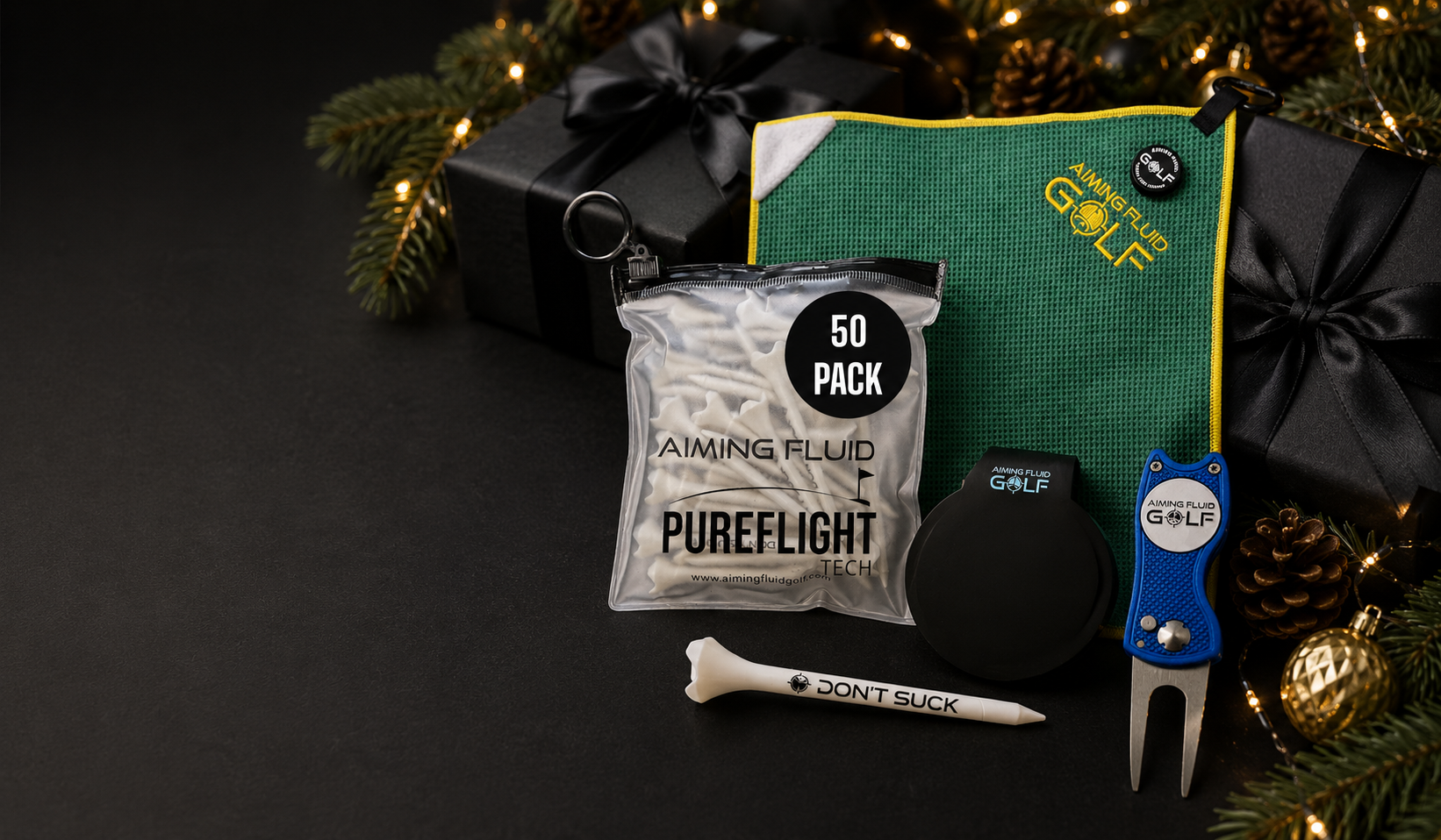 Aiming Fluid Golf magnetic towel, Landing Pad, foldable divot tool, metal ball marker and PureFlight tees on matte black