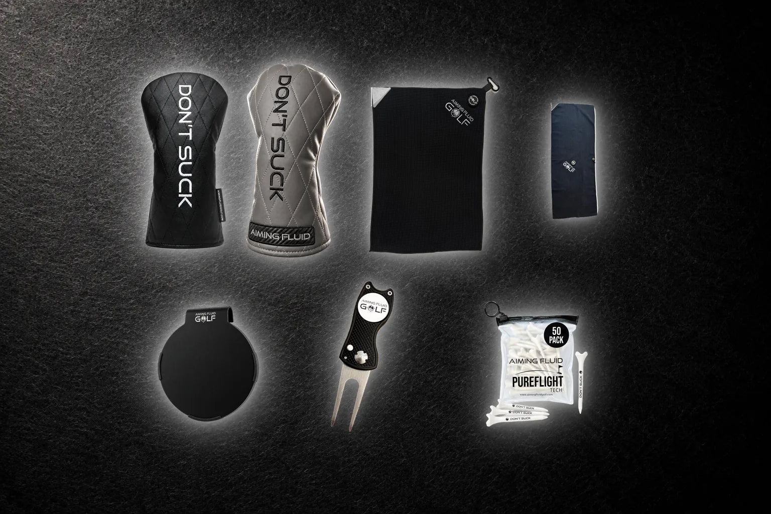 Seven golf essentials: Original and Smoke headcovers, Stubby and The 40 towels, Landing Pad, divot tool and PureFlight tees.